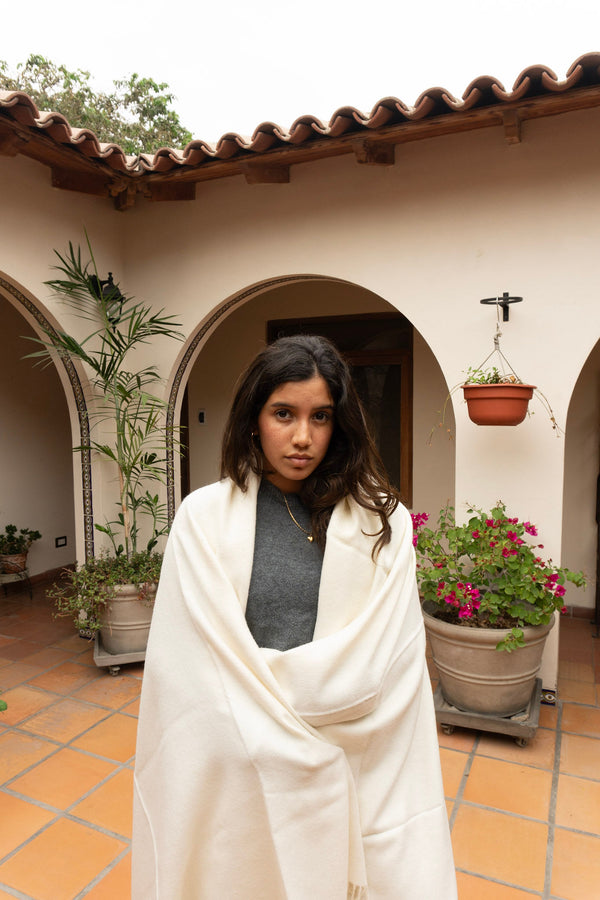The Throw, Natural — courtyard with bougainvillea