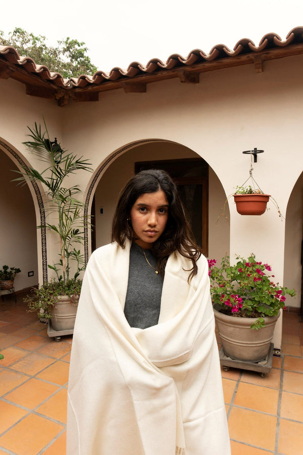 The Throw, Natural — courtyard with bougainvillea